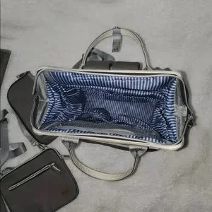 Sleepy panda diaper bag